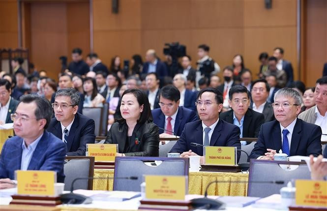 Các đại biểu dự Hội nghị công bố thành lập Trung tâm Tài chính quốc tế tại Việt Nam. Ảnh: Dương Giang/TTXVN thu-tuong-13.jpg